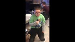 Jayden singing his favorite song at the autism center
