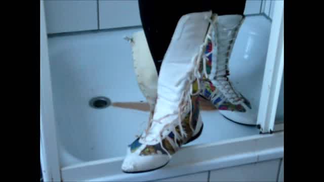 Jana fill messy and destroy her comic print boots in shower trailer