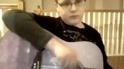 Spoiled immature 12-year-old autistic kid sucks at playing the guitar