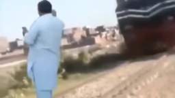 Pakistan man stops train