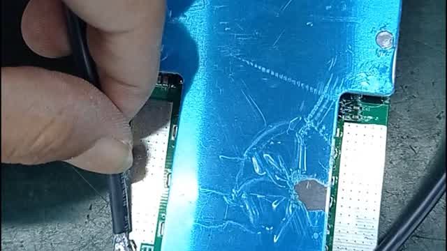 The soldering of wires in the Battery Management System (BMS).