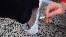 Janas friend uses her white ballerinas as an ashtray on her feets and burns them