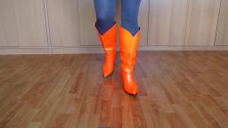 Jana shows her High Heel Westernboots shiny orange 9