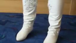 Jana shows her heel boots white knee high