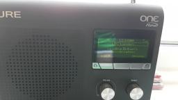 The PURE ONE Flow Portable Internet , DAB+ FM Radio playing talk radio