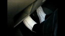 Jana drives the car with her Converse All Star Chucks high white and skinny black jeans trailer