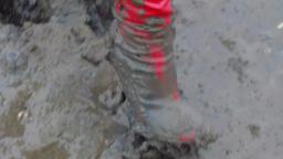 Jana goes to mud flat with her shiny red high heel overknee boots