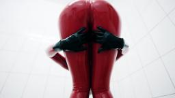 Honeyhair on red latex catsuit
