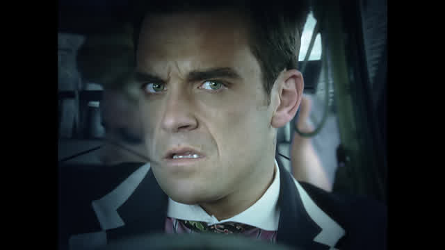 Robbie Williams - Tripping (Official Music Video)
