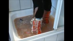Jana fills messes up and squeaks in the shower with her shiny red Adidas Honey boots trailer