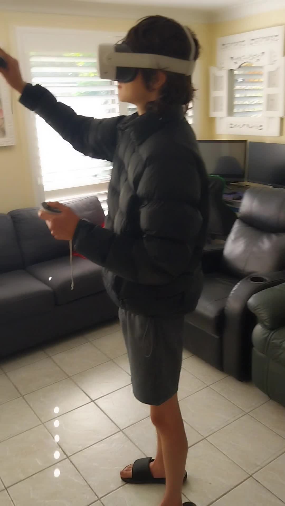 my friend playing my VR headset