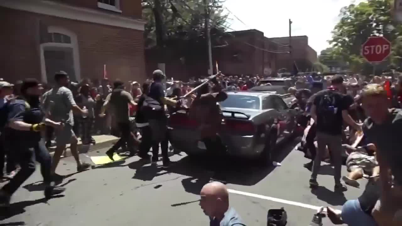 based man drives over people at a BLM protest