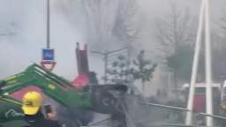 Several hundred farmers protest in Bordeaux, France; police disperse them with tear gas.