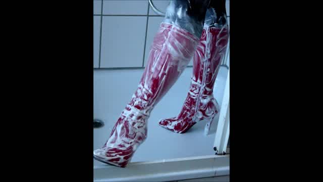 Jana messy her stiletto stretch boots shiny red and washed them in the shower trailer