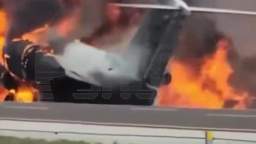 A private plane crashes into a car and bursts into flames after failing to land on a Florida highway