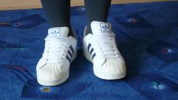 Jana shows her Adidas Superstars white shiny blue