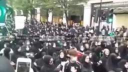 Procession down Oxford Street - London today