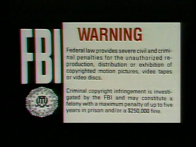 Warner Home Video FBI Warning and Canadian warning scroll Warner Home Video FBI Warning and Canadian warning scroll