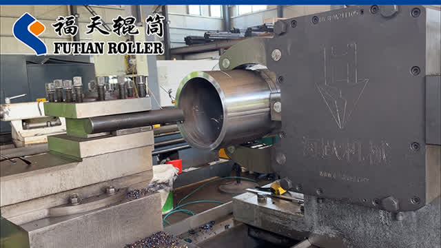 Turning the roller with a hydraulic steady rest tool.