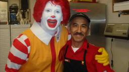 JOSE THE JANITOR IS VERY BUSY CLEANING THE DIRTY BATHROOM