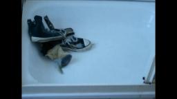 Jana washes, messes up and destroys her Chuck Taylor Converse high green in the shower trailer