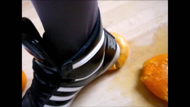 Jana crush oranges with her Adidas Top Ten hi shiny black and white close up trailer