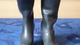 Jana shows her black rubber riding boots