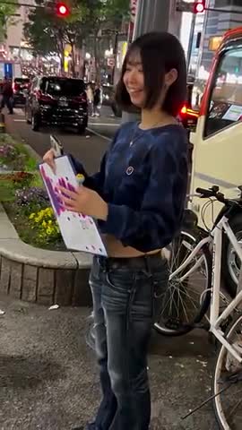 Cameraman Fist bumps cute asian girl