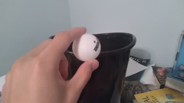 Throwing a Ping Pong Ball Into a Garbage Can