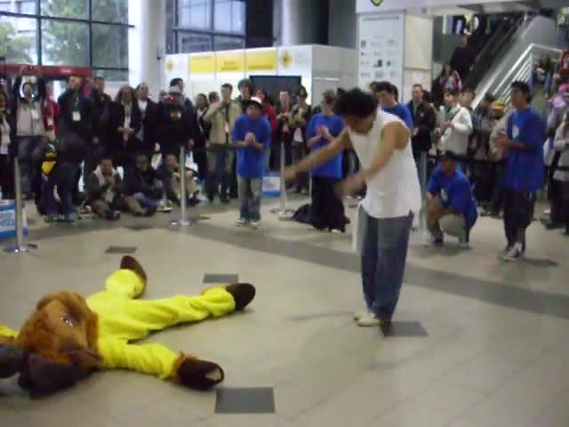 Richard Stallman dancing with GNU on FISL 10