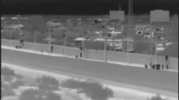 illegals (beaners) jump over border wall near Yuma Arizona