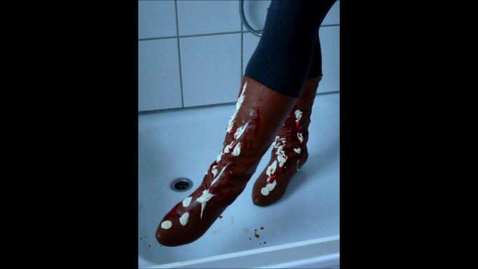 Jana messes up, fills and destroys her brown heel boots in the shower trailer