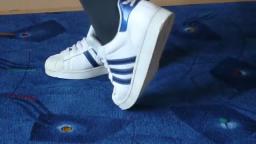 Jana shows her Adidas Superstars white shiny blue