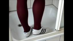 Jana write on squeaks with her Adidas Martial Arts white black and destroy them in shower trailer