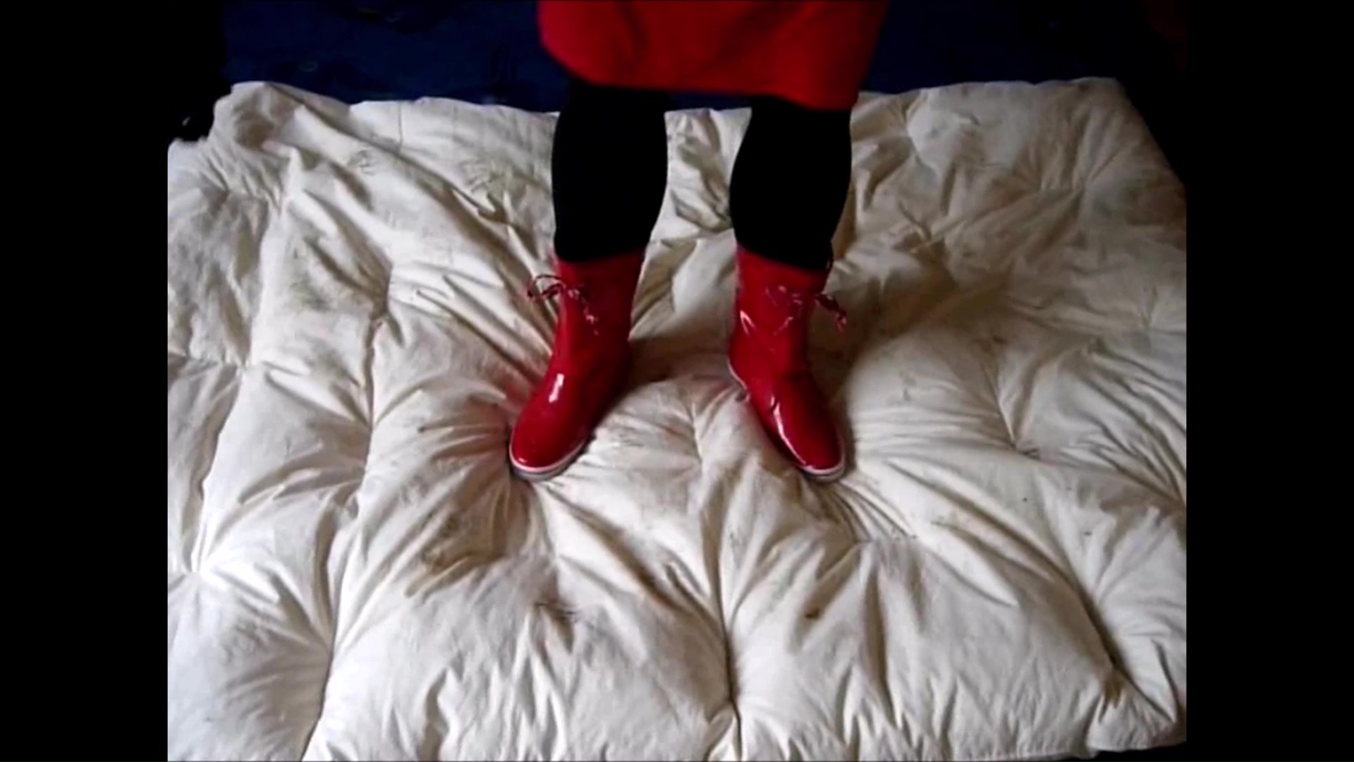 Jana tramples on duvet with different boots trailer