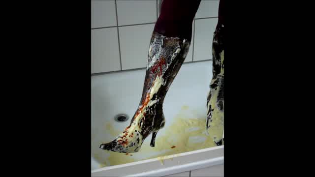 Jana fill messy and wash her stiletto tiger stretch boots in shower trailer