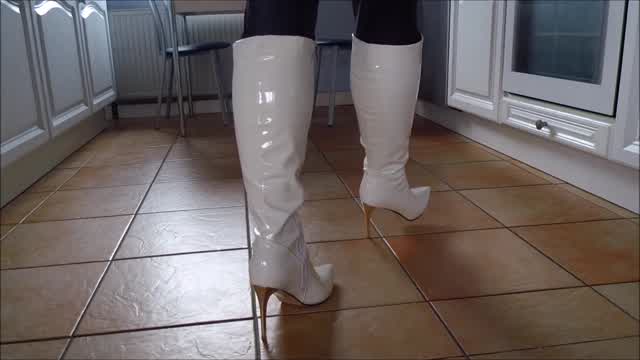 Jana at kitchen work with her shiny white high heel stiletto boots trailer