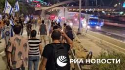 Police used water cannons to disperse protesters from Tel Avivs central highway