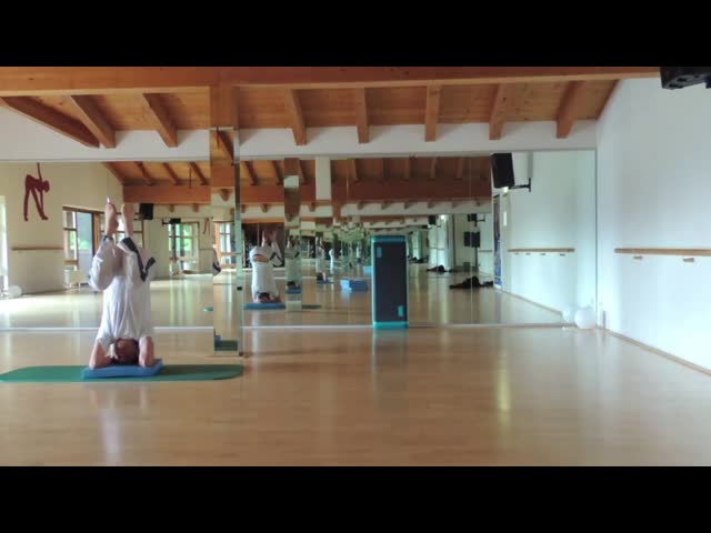Headstand with balance pad
