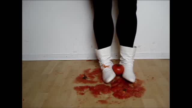 Jana crush tomatoes with her white ankle boots flat trailer