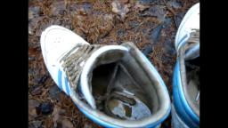Jana walks in the forest mud and puddles in her white metallic blue Adidas Top Ten Hi trailer