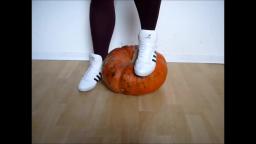 Jana crushes a pumpkin with her shiny white Adidas Top Ten Hi sneakers trailer