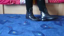 Jana shows her black Romika rubber boots with rear zipper