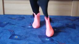 Jana shows her glow in the dark shiny rubber booties pink with black loop