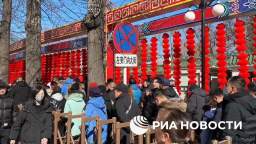 In Beijing, on the first day of the Lunar New Year, there is a rush at traditional holiday fairs