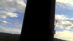 HEAVY steel clete slamming HUGE steel electrical tower