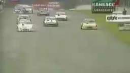 Race car slides into man