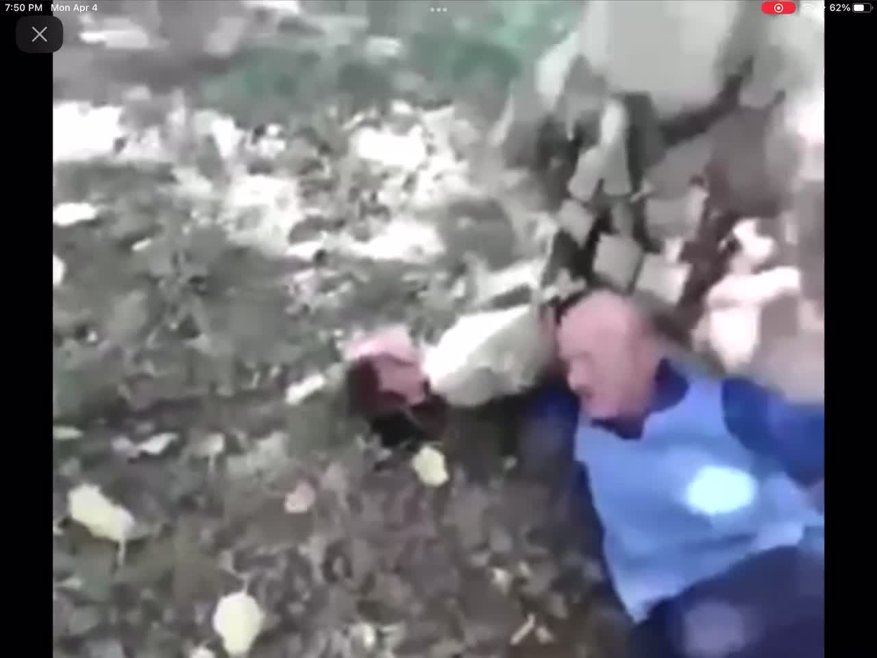 Ukrainian soldier tortures old man, cuts open