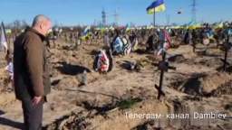 French Ambassador to Ukraine Etienne de Poncins at the huge cemetery of the graved Ukrainian Armed F
