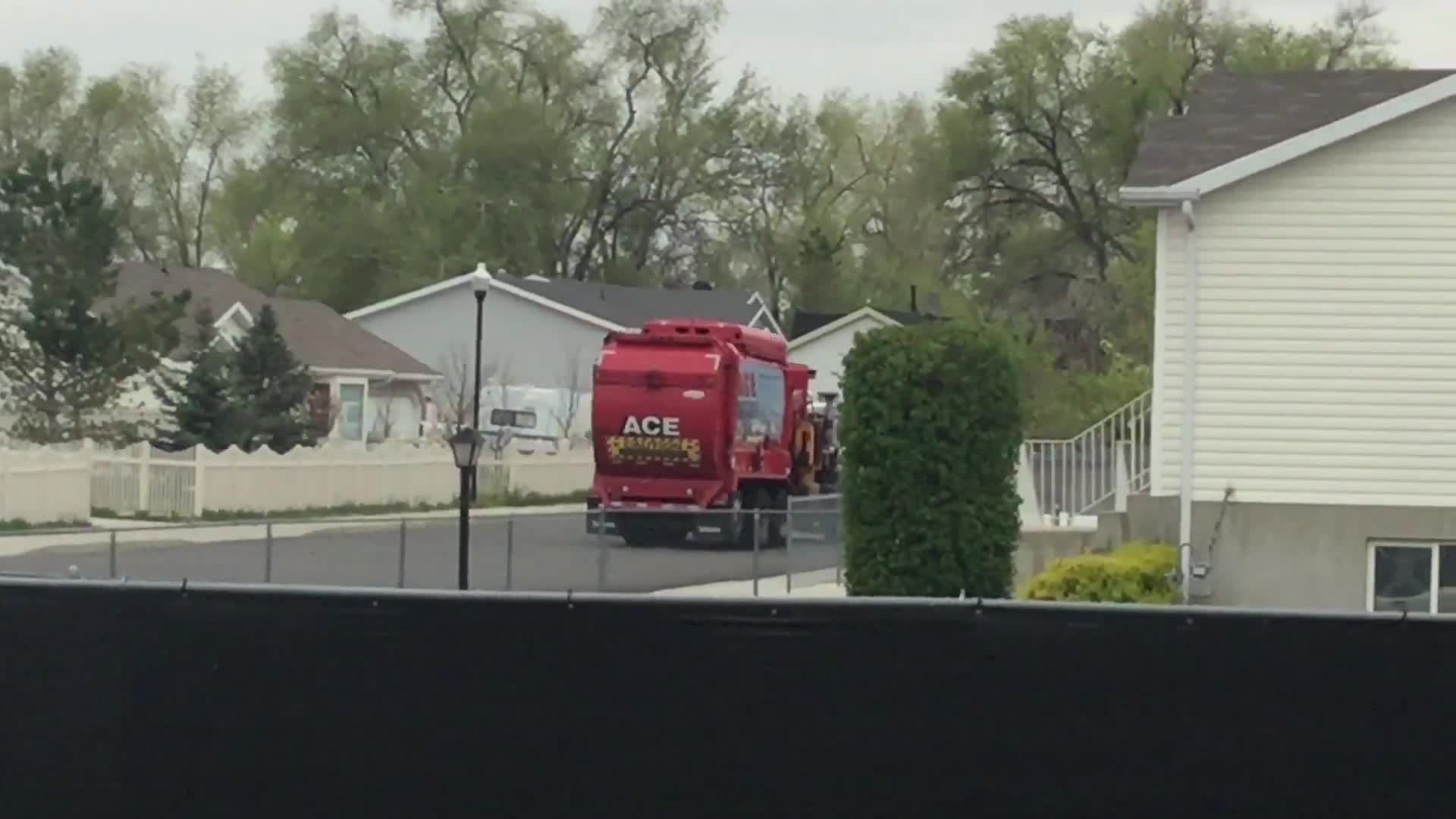 A school bus and a garbage truck - Recorded on April 26, 2022, at 4:10PM MT